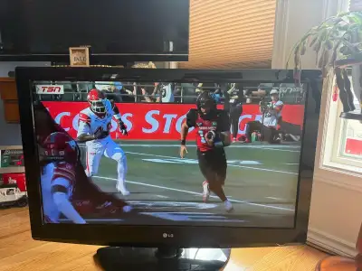LG 42" TV WITH REMOTE, View more