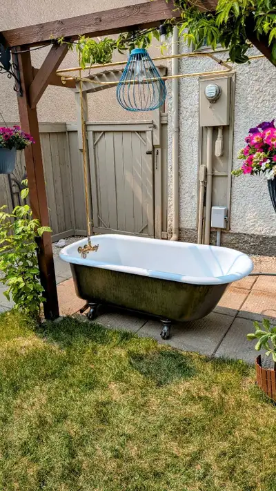 Antique 1917 porcelain 45" claw foot tub & brass shower curtain, View more
