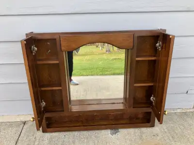 All wood cabinet in excellent condition. Many compartments. Well made, very durable. Can be painted.