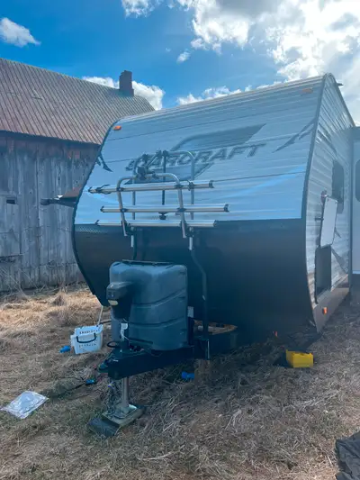 Arvika bike rack kit for travel trailers. Mounts above the gas tanks on your trailer, holds up to 4...