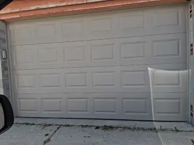 12x7 insulated Garage Door like new, View more