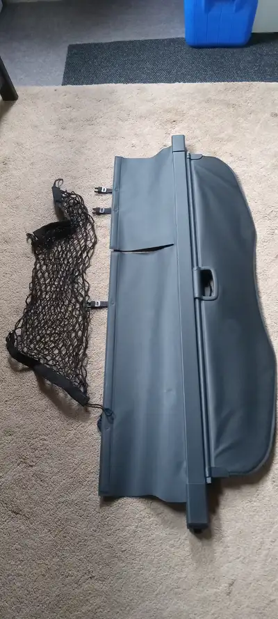 Rollback Cargo Cover and net - $75.00 Set of Carpet mats - $50.00 Rubber back seat mats - $20.00 Rub...