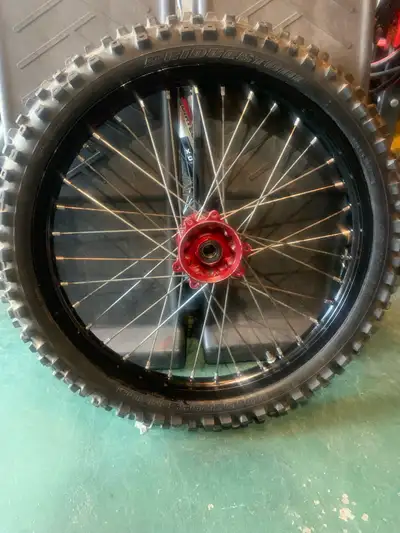 Honda 250r front rim Will work on a 450r or a cr125r Mint shape New wheel bearings and new tube just...