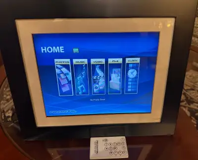 12” Digital Image Frame with remote control Memory Card Formats: Secure Digital™, Multi Media Card™,...