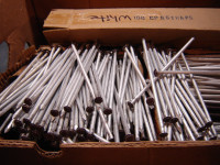 Box of aluminum nails, 8" long, brown//white//bare color