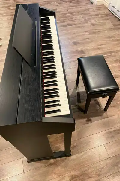 Electric piano - Casio Celviano AP-450 used with a piano chair, View more