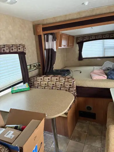 Redused to 13000.00 This 2012 Jayco Jay Feather travel trailer is a 27ft with slide out * Easy pull-...