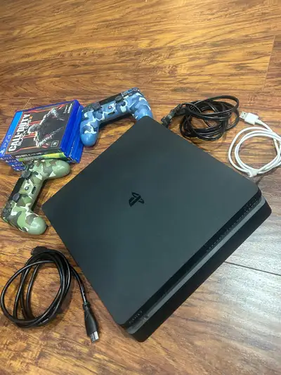 Play station ps4 with  5 games, View more