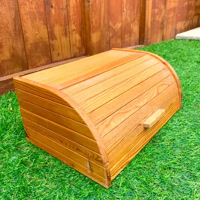 Bread box, kitchen storage, wooden bread bin for storing bread, buns, bagels, and baked goods while...