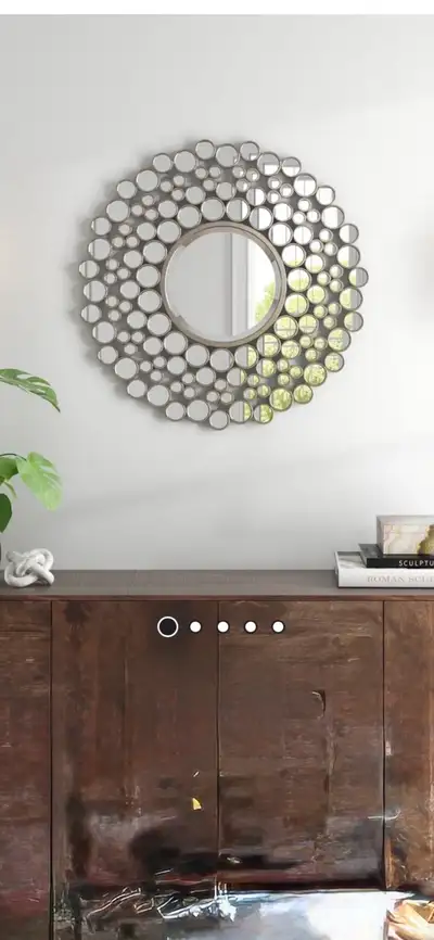 Measures approx 42” in diameter. Metal frame rings. Excellent condition. A great accent piece.
