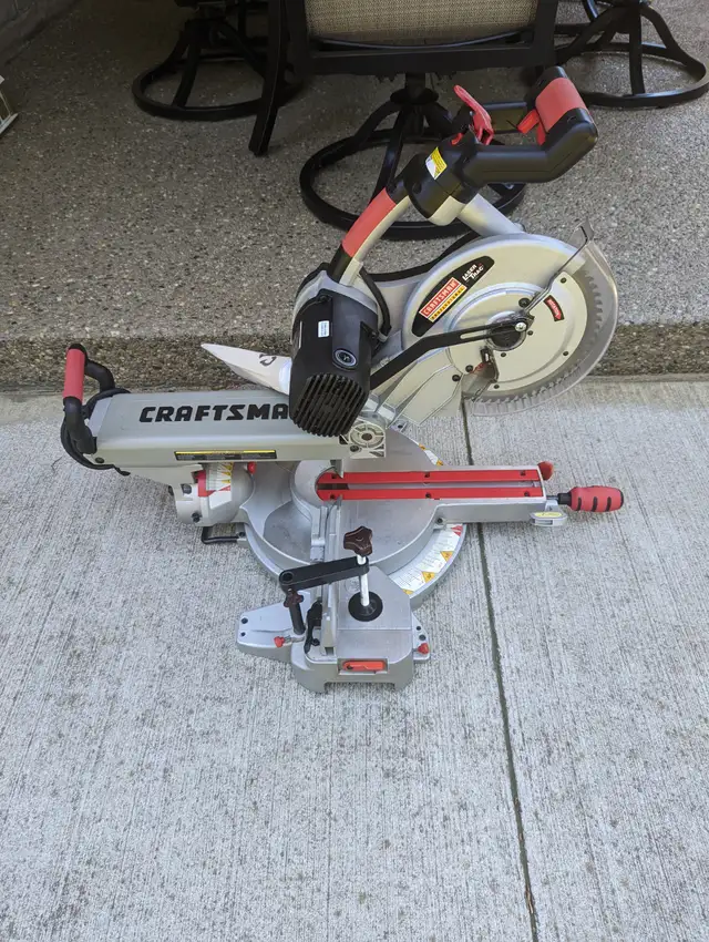 10 in. CRAFTSMAN SLIDING MITRE SAW with NEW STAND in Power Tools in London - Image 3