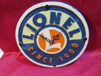 PARKER PICKERS - The ceramic 8" round and heavy wall clock advertising is $29 FIRM! The fantasy tin...