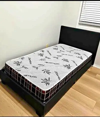 This is a used twin-size Bamboo mattress, perfect for a guest room or a child's bedroom. It comes wi...