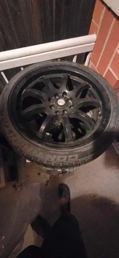 These Continental alloy wheels are in used condition, showing signs of wear consistent with previous...