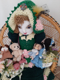 Hand crocheted doll with chair