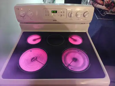 Kenmore white electric stove for sale in good working condition., View more