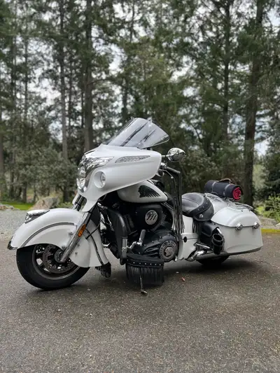 Experience the thrill of the open road on this stunning, pearl white 2017 Indian Chieftain, which is...