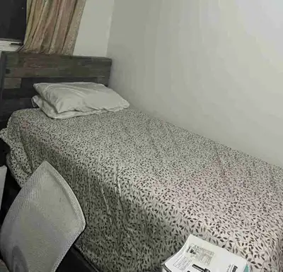 Twin bed frame and mattress. Good condition.