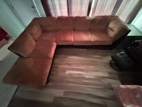 Brown sectional couch.