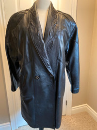 Woman’s black leather coat