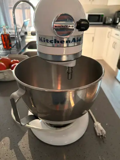 Kitchen Aid Mixer with 3 attachments. New is 450.00.