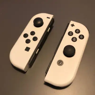Nintendo orginal  White Nintendo Joy-Cons set, View more