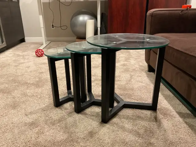 3 round nesting tables - glass tops from Urban Barn