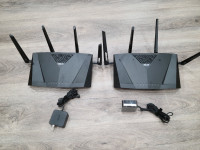 Two ASUS AC3100 routers.