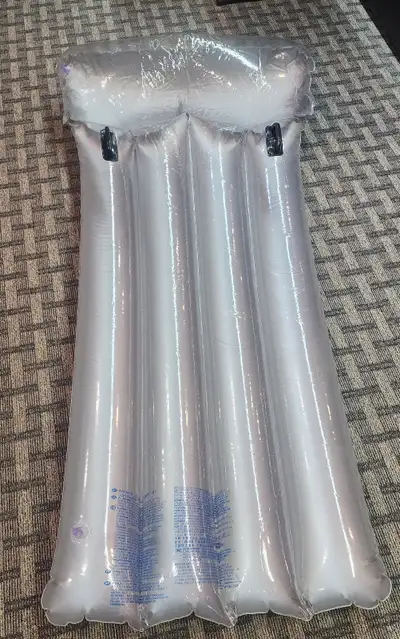 Water Air Mattress. New. Never used. 68" long x 32" wide. 2 for sale. $8 each
