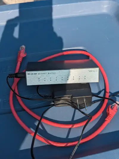 8-Port Gigabit Metal Unmanaged Desktop Switch, used very little, functions as new, includes AC adapt...