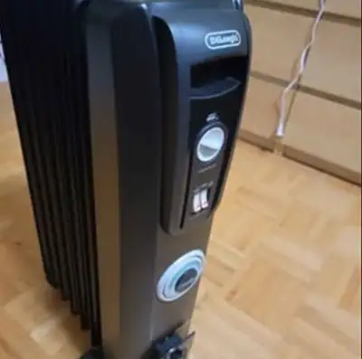 DeLonghi Oil-Filled Radiator Space Heater, Quiet 1500W, Adjustab, View more