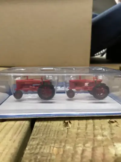 HO scale Tractors two red vintage tractors, great for flat deck loads or farm diorama. $20 no shippi...