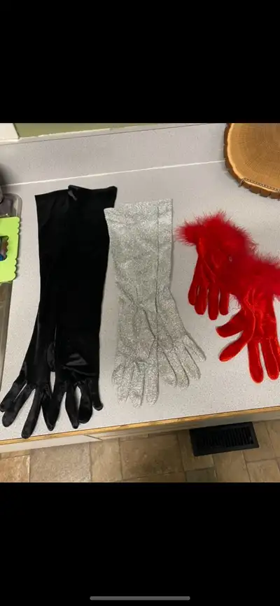 Beautiful dress up gloves all for $12 There are no sizes marked, but they are a medium to small. I t...