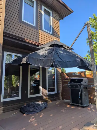 8 foot aircraft aluminum patio umbrella. 10 years old but in great condition. Well maintained. Inclu...