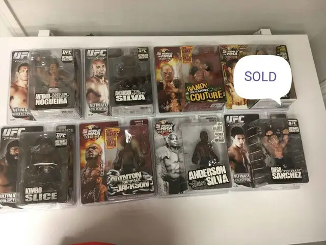 UFC lot - 11 figures and 1 belt