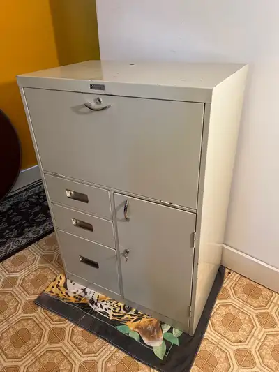 Compact fold down desk with lots of storage. Dimensions are 29” wide x 18” deep x 42” high. Solid me...