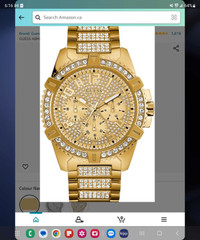 Guess gold and diamond watch brand new retail at 300,$ 