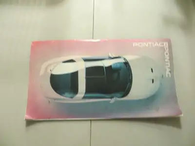 1995 PONTIAC DEALER SALES BROCHURE. COVERS FULL PRODUCT LINE. FRONT IS FADED FROM SUN BUT OTHERWISE...