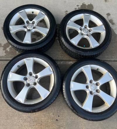 $180 FIRM I have 4 original 17 inch Mazda rims on Michelin Pilot 205/50R17 all season tires. Rims ar...