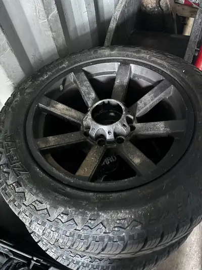 Selling these rims and tires, bought them to use for winter rims and tires but only used them once f...