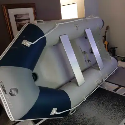3.3m (10.8ft) Tobin Sport inflatable boat with trolling motor. Excellent shape