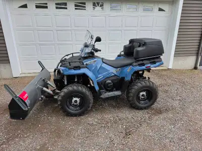 Atv is fully loaded and has never been offroad. Only 250 km and shows like new. Accessories included...