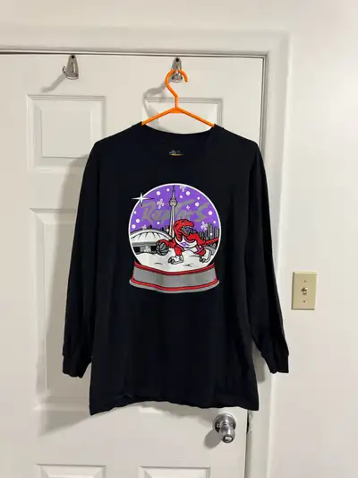 Selling a cool OVO (October's Very Own) x Toronto Raptors long sleeve shirt! It's a black long sleev...
