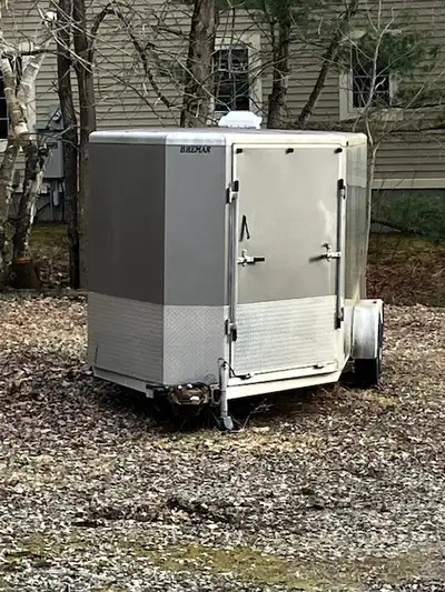 Bremar 7'x14' cargo trailer with 5' v-nose and left front ramp door. 6' interior height, added 1/4'...