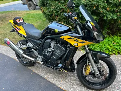 The Yamaha FZ1 (often sold as the FZ1 Fazer) is a versatile, high-performance sport-standard motorcy...