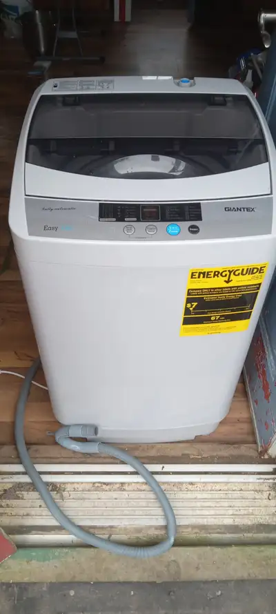 Fully automatic small energy and water efficient washing machine. Used 6 times. Works great. Drum si...