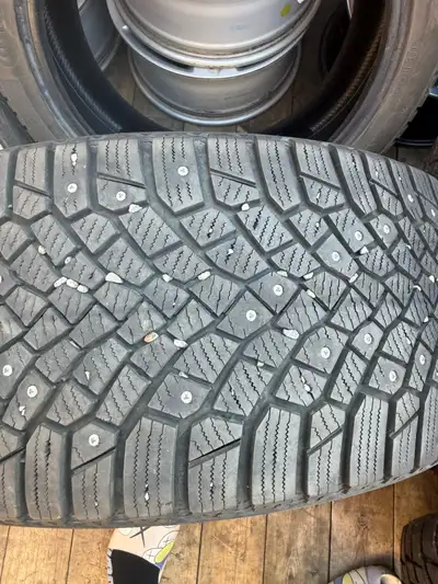 Very good condition studded winter continental Very low km used