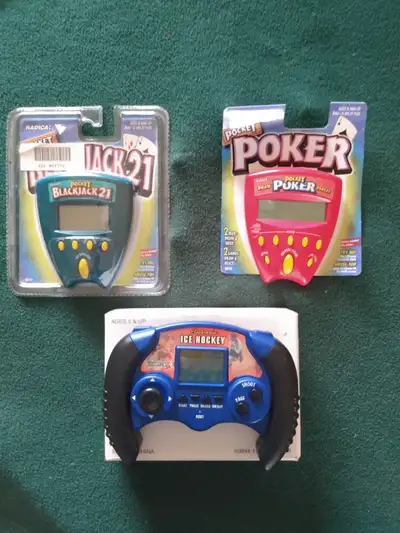 Collectible battery-operated games (batteries not included). Poker & Ice Hockey $5 each. Blackjack g...