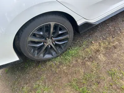 Looking to trade my 235/45/zr 18 low pro tires and rims for hopefully a set of blades or maybe Mazda...