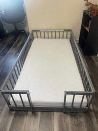 Brand new twin size toddler floor bed WITH MATTRESS , ITS AVAILA